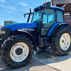 New Holland TM 120 i zapasowe waskie koła 2 tyl 2 przód