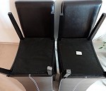 4 krzesła - złożone po 2 razem - siedziskami do siebie