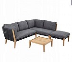 Sofa 2-elementowa z podnóżkiem i stolikiem.