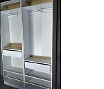 Dwie szafy: Wys 236cm, szer 75cm, głęb 36cm.  Łącznie tworzą szafę o wymiarze 150 x 236 cm