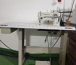 Maquina de coser con bancada